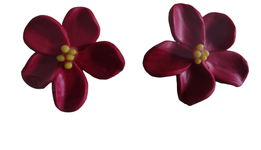 Pantallas de arcilla polimérica de flores hechas a mano